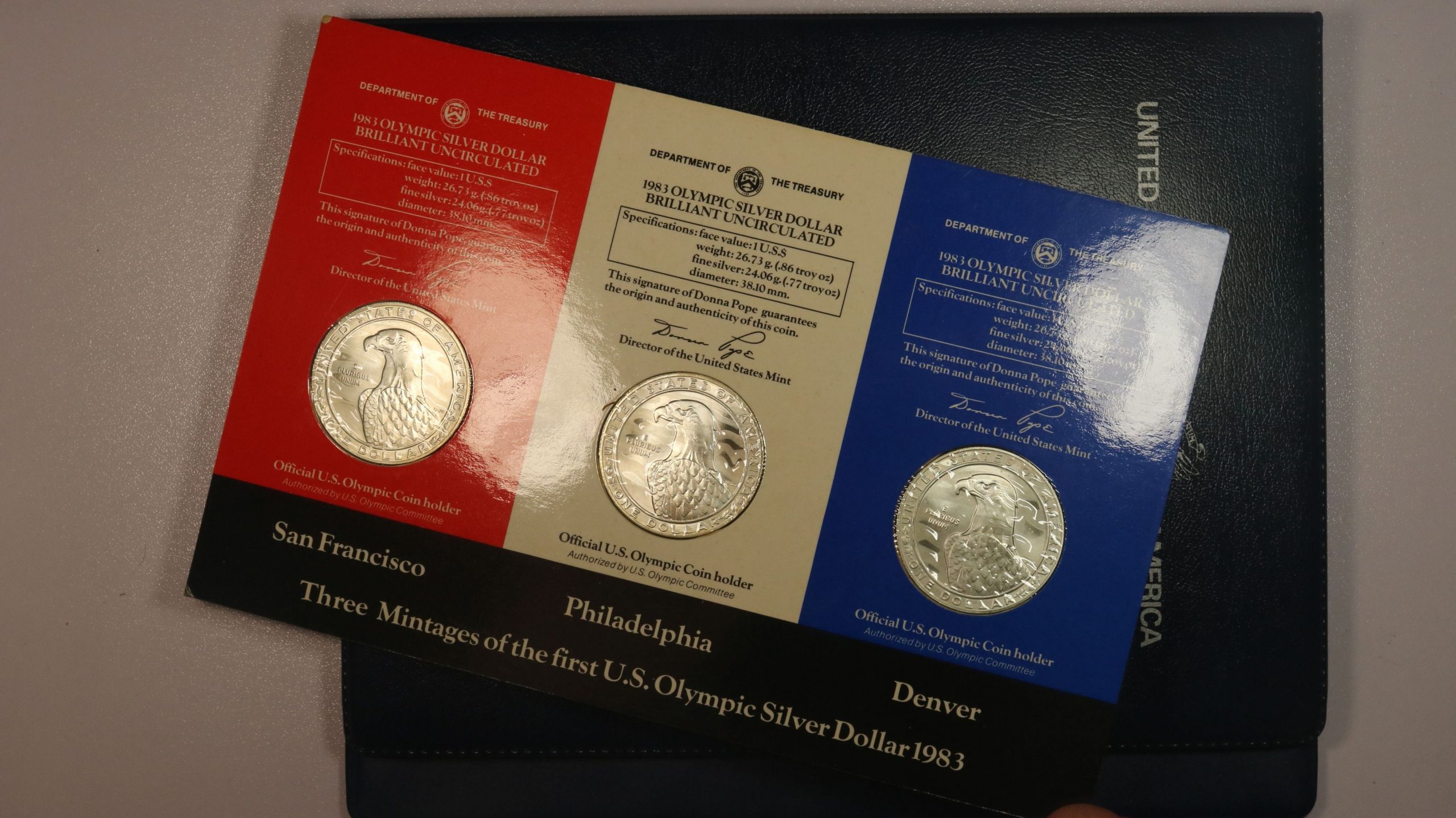 362216932_1479717152845616_6842749858540392148_n USA-1983-OLYMPIC-GAMES-Brilliant-Unc-SILVER-DOLLARs-3-COIN-SET-with-presentation-album
